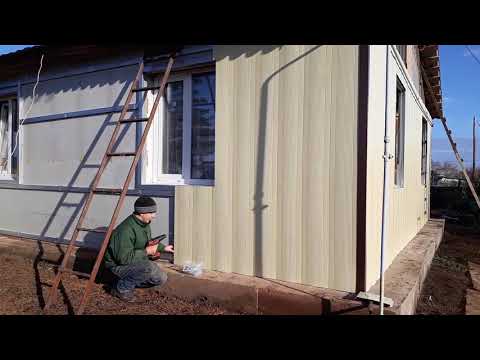Фасады домов из сайдинга: особенности, фото